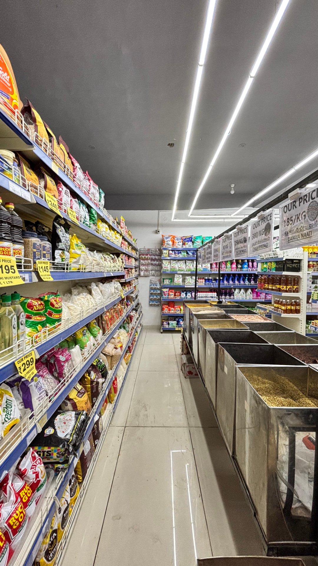Staples and loose grains section with transparent pricing